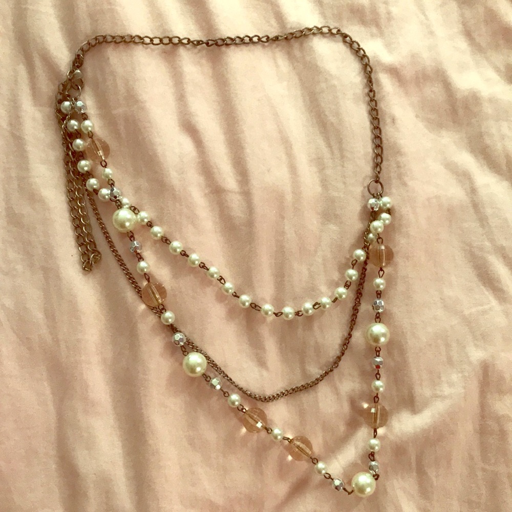 A symmetrical pearl necklace